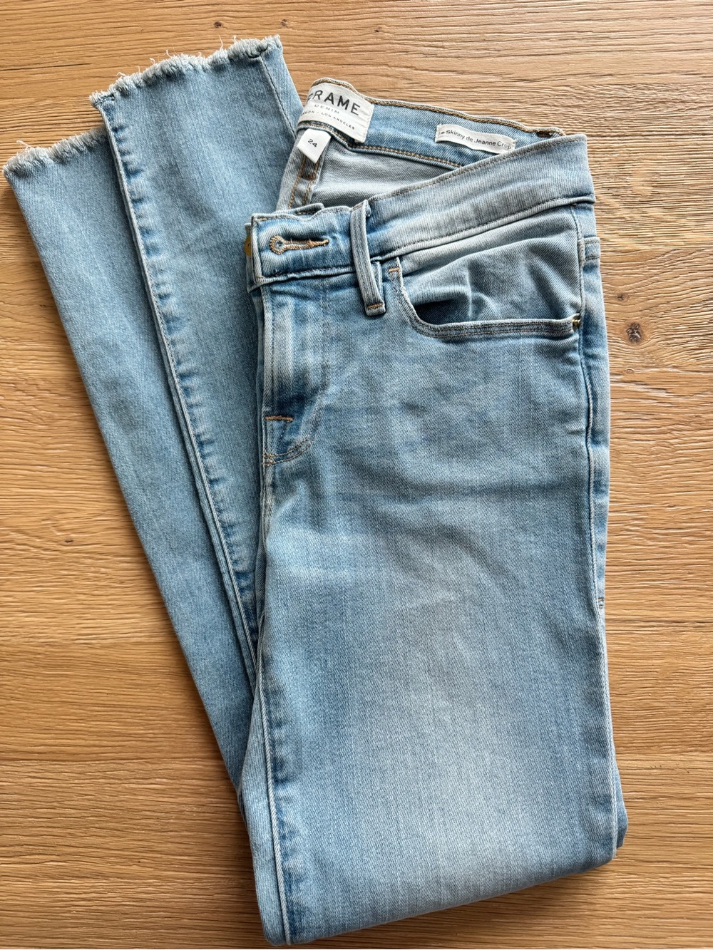 Frame skinny jean, frayed hem.